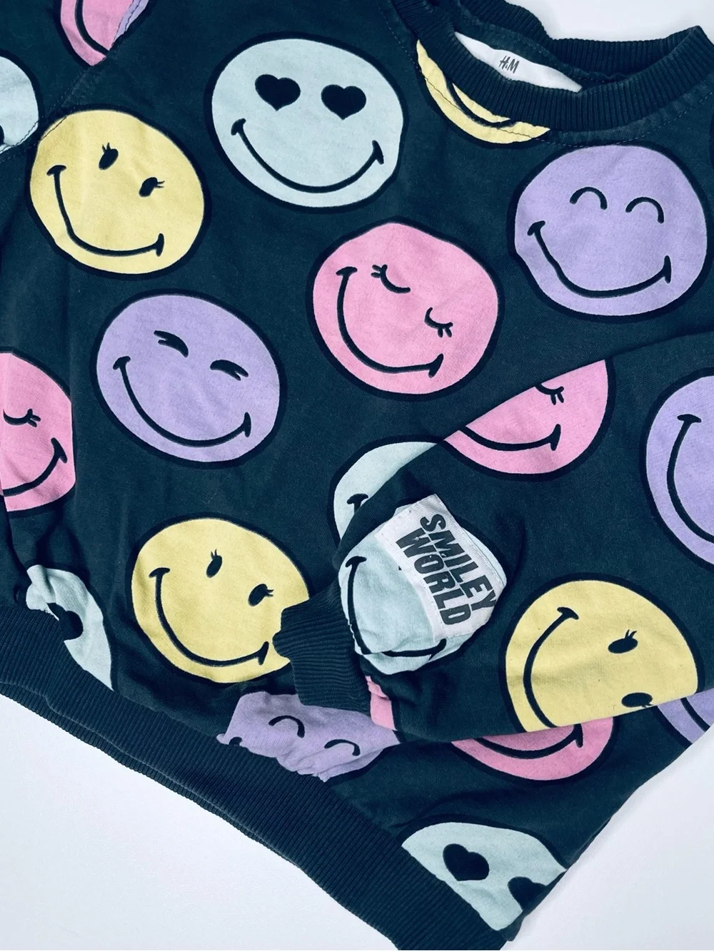 H&M Black Sweatshirt with Pastel Multicolor Smiley Faces